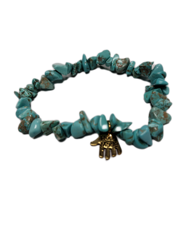 Rough tumbled bead turquoise bracelet with charm that says "handmade"